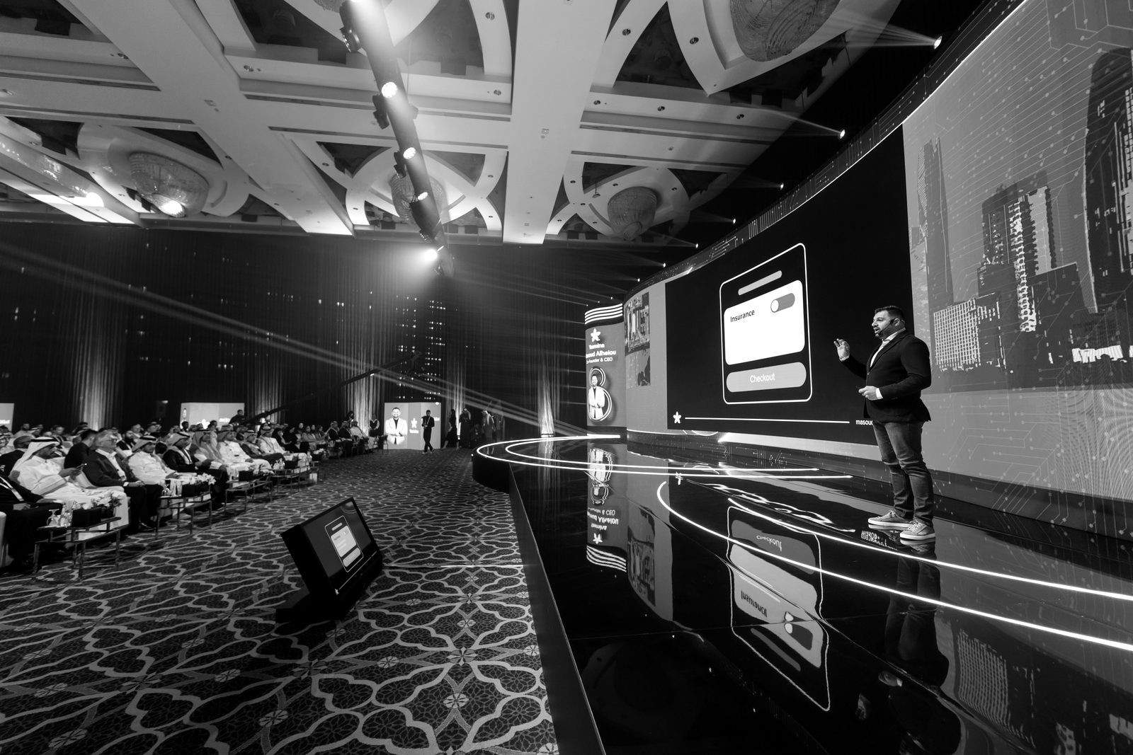 Masoud presenting Yasmina on stage